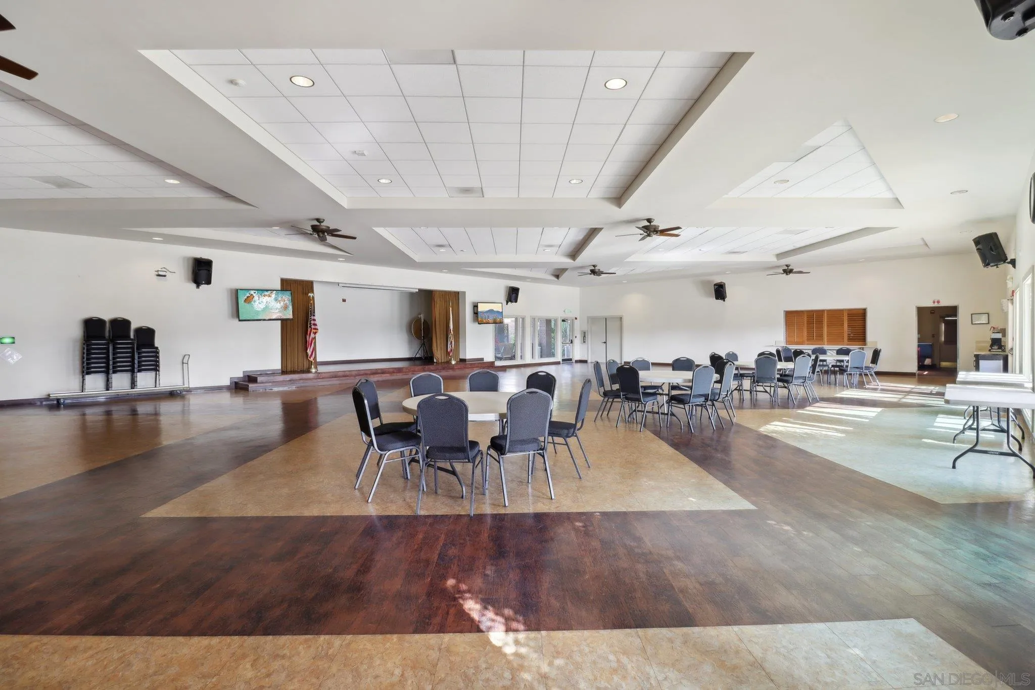 7002 San Bartolo Street, Unit 30 Carlsbad, CA 92011 - Photo 53 of 59 a living room with lots of furniture and a view of kitchen