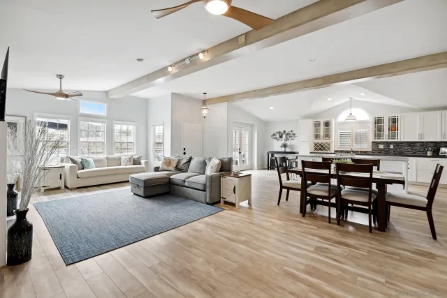 a living room with furniture and a table