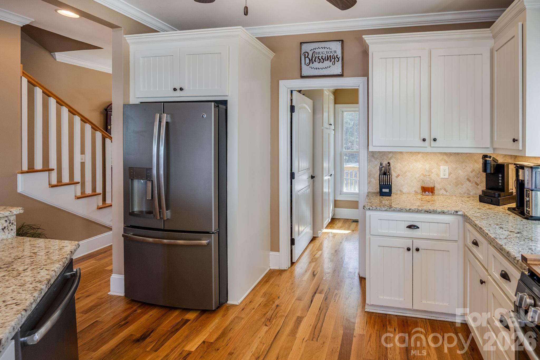 2583 Rockbridge Road Ridgeway, SC 29130 - Photo 15 of 48 a kitchen with granite countertop stainless steel appliances a refrigerator a sink and cabinets