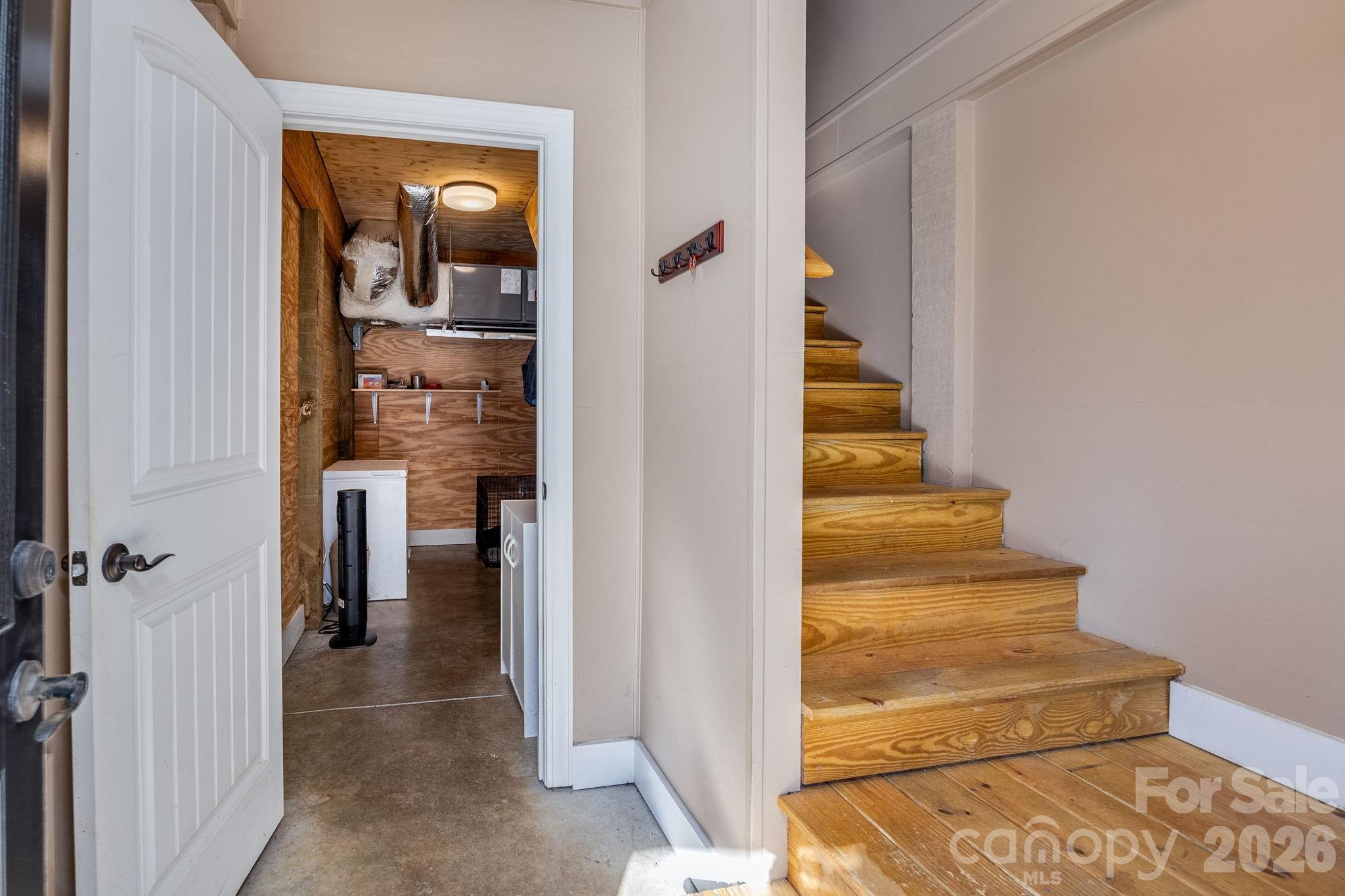 2583 Rockbridge Road Ridgeway, SC 29130 - Photo 31 of 48 a view of staircase with white walls and door