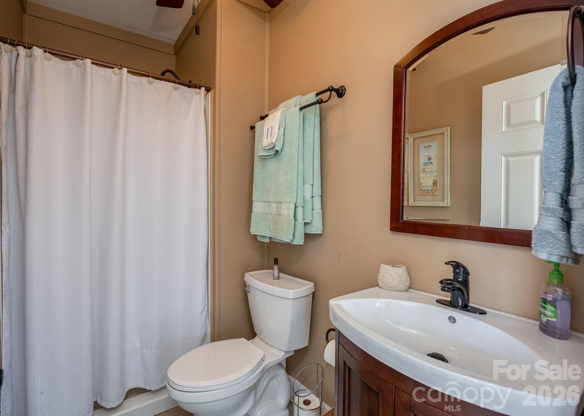 2583 Rockbridge Road Ridgeway, SC 29130 - Photo 32 of 48 a bathroom with a sink toilet and shower