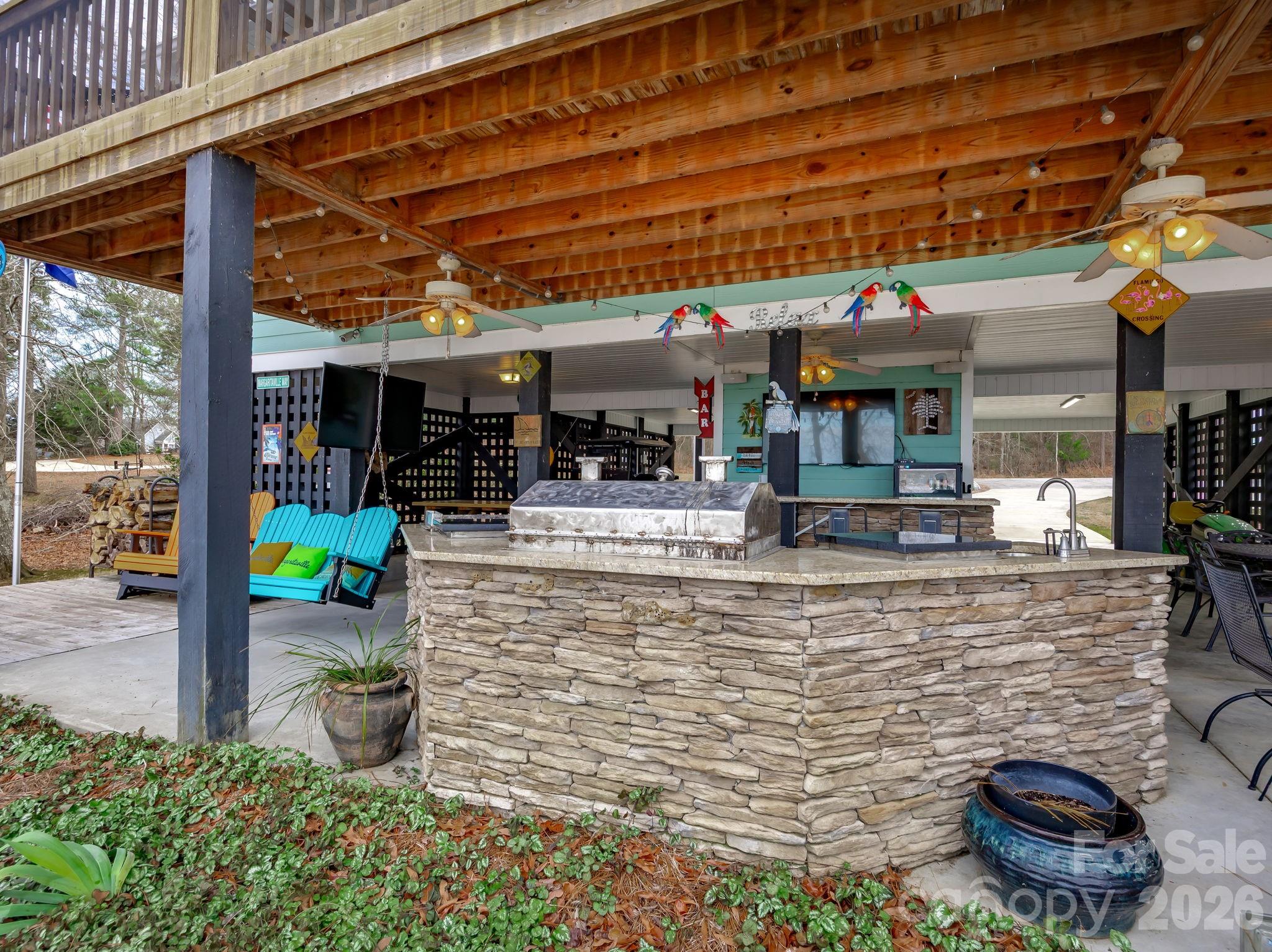2583 Rockbridge Road Ridgeway, SC 29130 - Photo 34 of 48 a view of a chairs and table in the patio