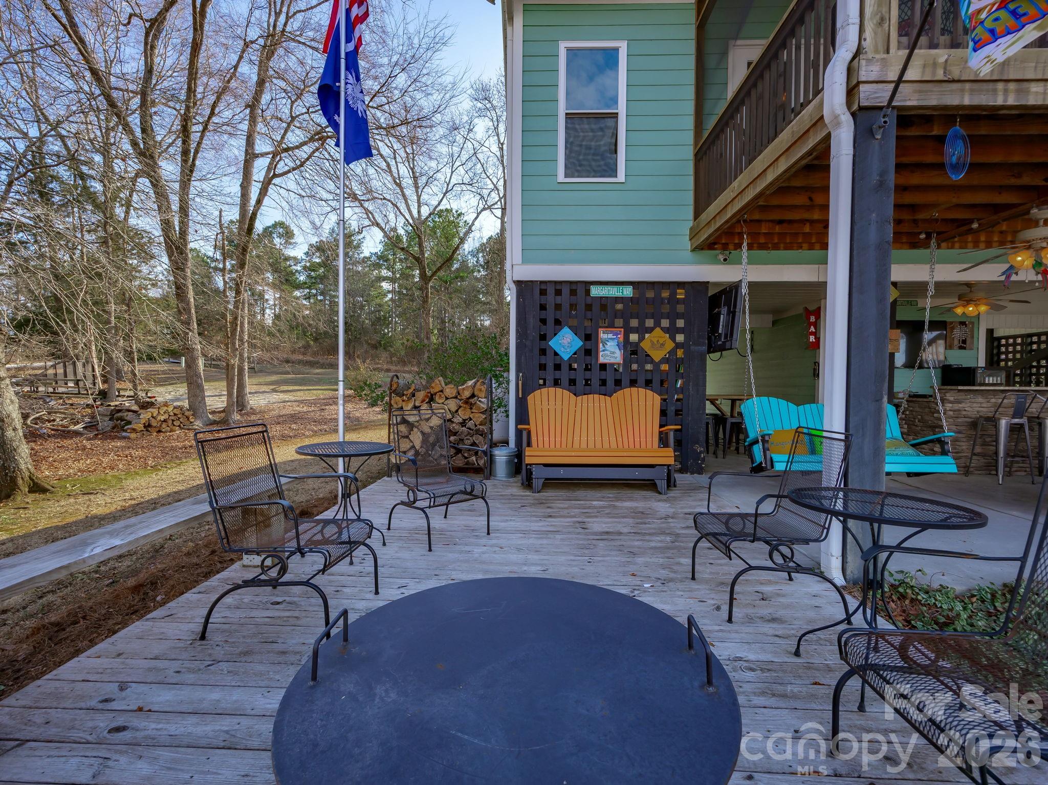 2583 Rockbridge Road Ridgeway, SC 29130 - Photo 41 of 48 a view of a chairs and tables in a patio