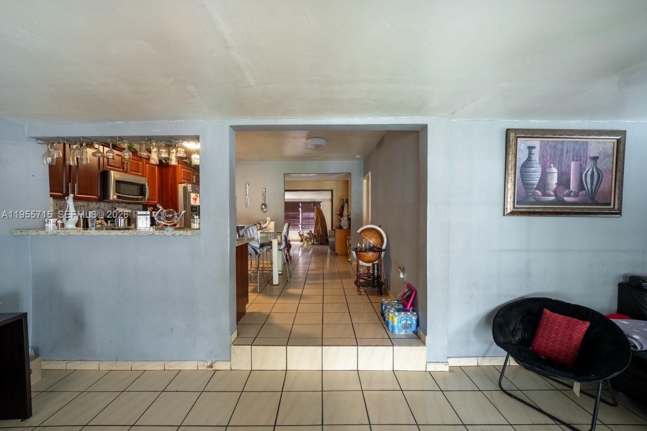 671 East 6th Place Hialeah, FL 33010 - Photo 11 of 40 a living room with furniture