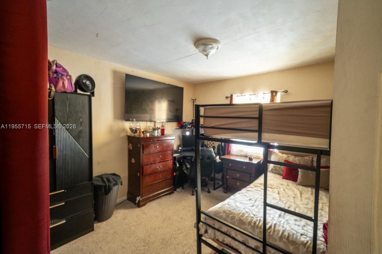 671 East 6th Place Hialeah, FL 33010 - Photo 20 of 40 a room with storage and utility