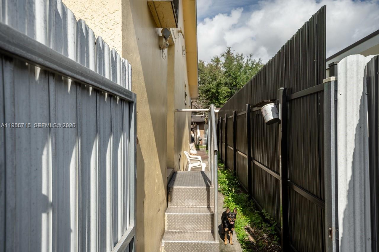 671 East 6th Place Hialeah, FL 33010 - Photo 26 of 40 a view of a pathway of a house