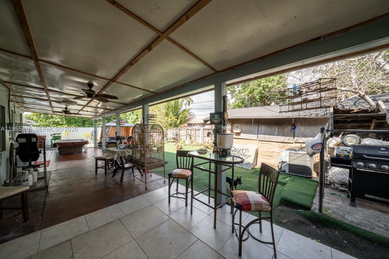 671 East 6th Place Hialeah, FL 33010 - Photo 27 of 40 a outdoor space with lots of table and chairs