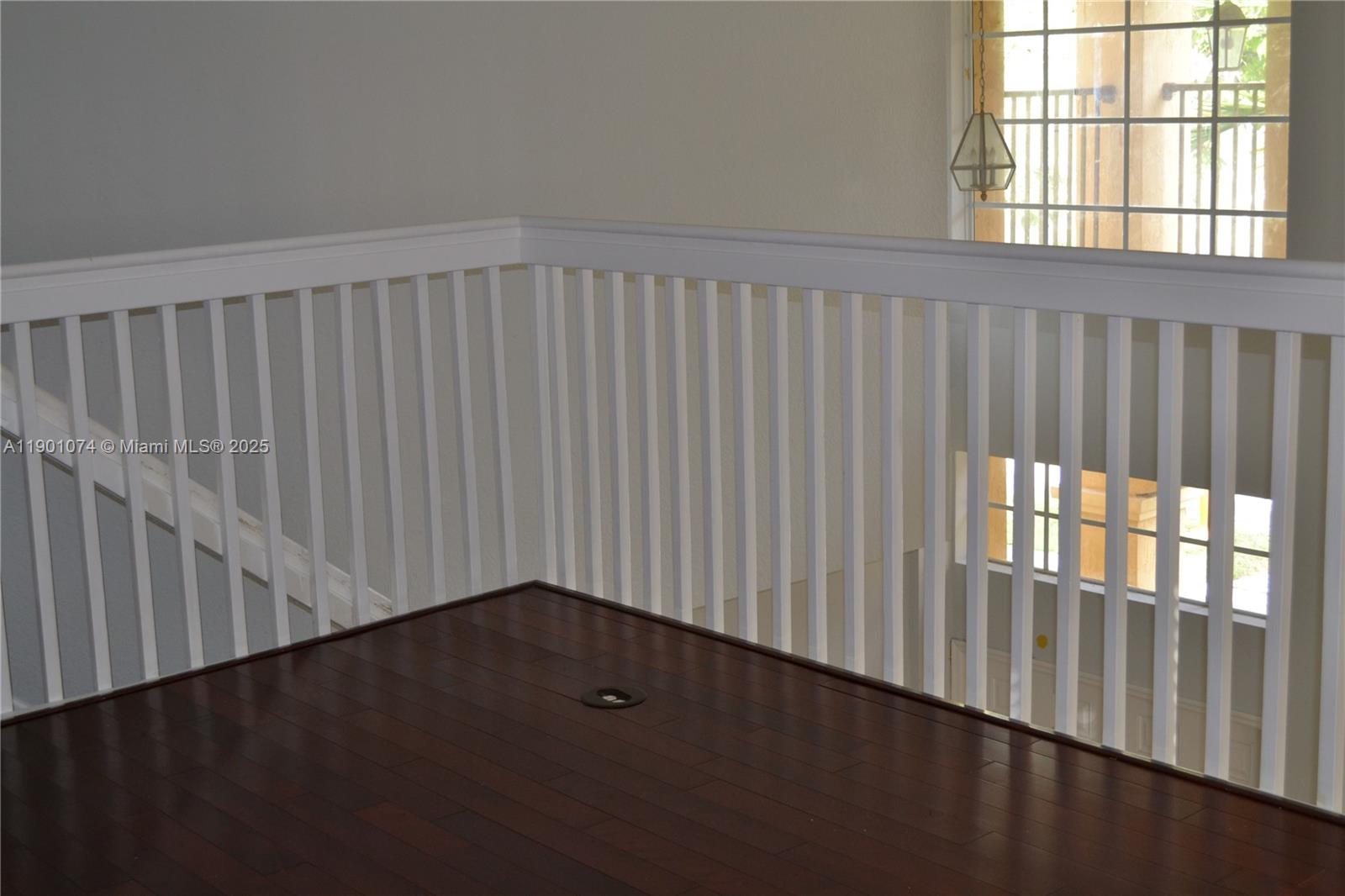 22418 Southwest 94th Path Cutler Bay, FL 33190 - Photo 19 of 71 a view of a black and white wall