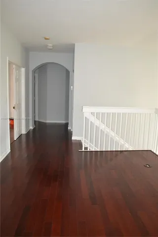 a bathroom with a granite countertop sink a shower and a mirror