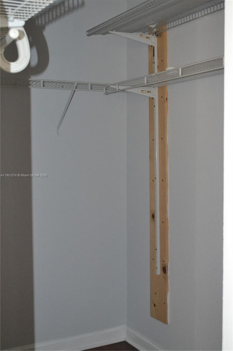 22418 Southwest 94th Path Cutler Bay, FL 33190 - Photo 28 of 71 Master bedroom walk in closet.