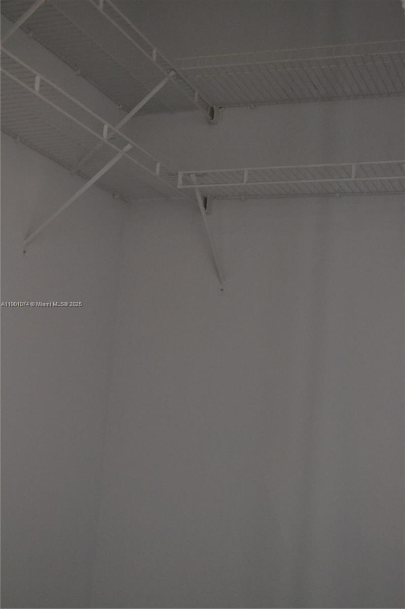 22418 Southwest 94th Path Cutler Bay, FL 33190 - Photo 29 of 71 a view of a rack on the wall