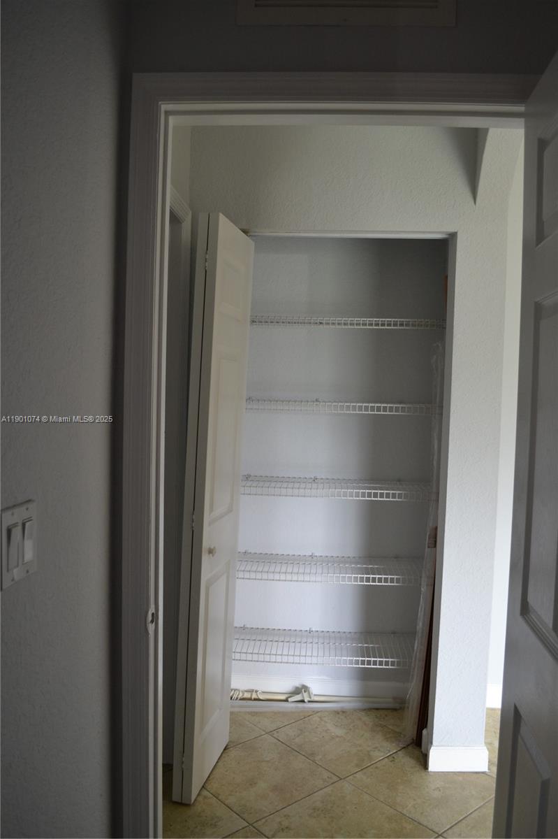 22418 Southwest 94th Path Cutler Bay, FL 33190 - Photo 42 of 71 Linen closet on the first floor.