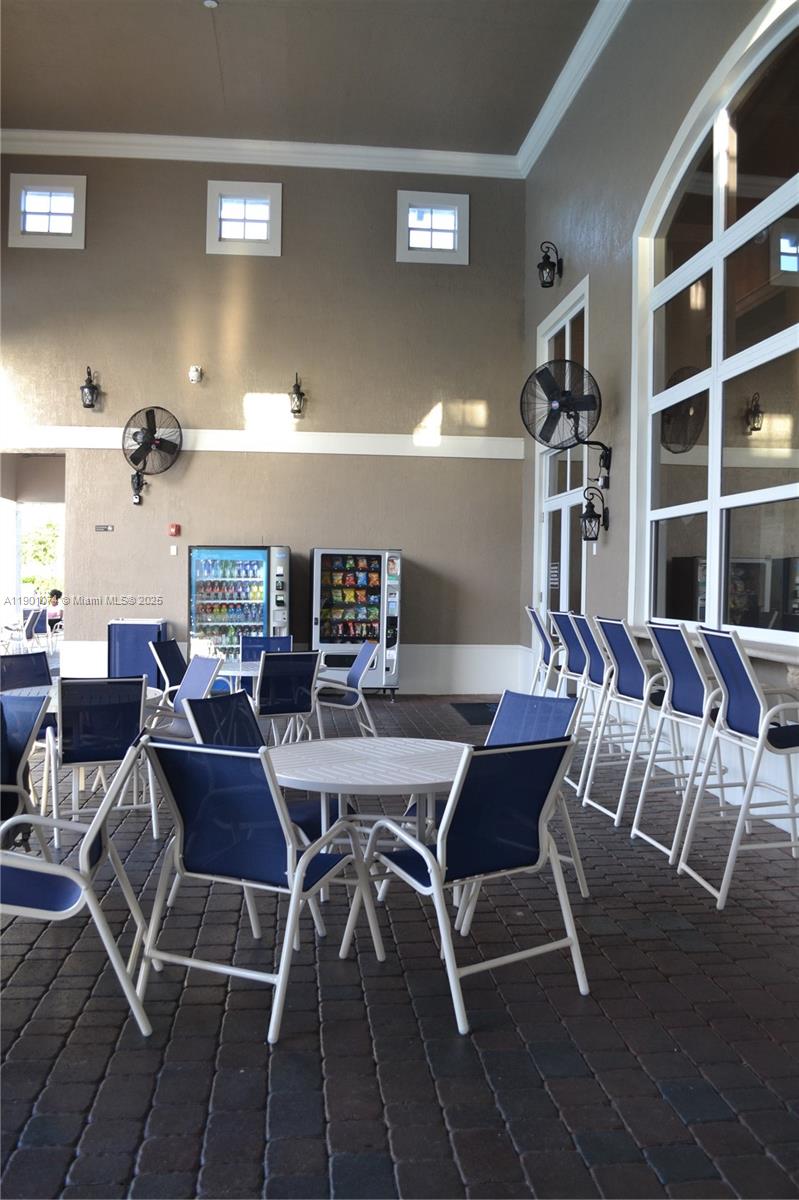 22418 Southwest 94th Path Cutler Bay, FL 33190 - Photo 63 of 71 a view of a dining room with furniture