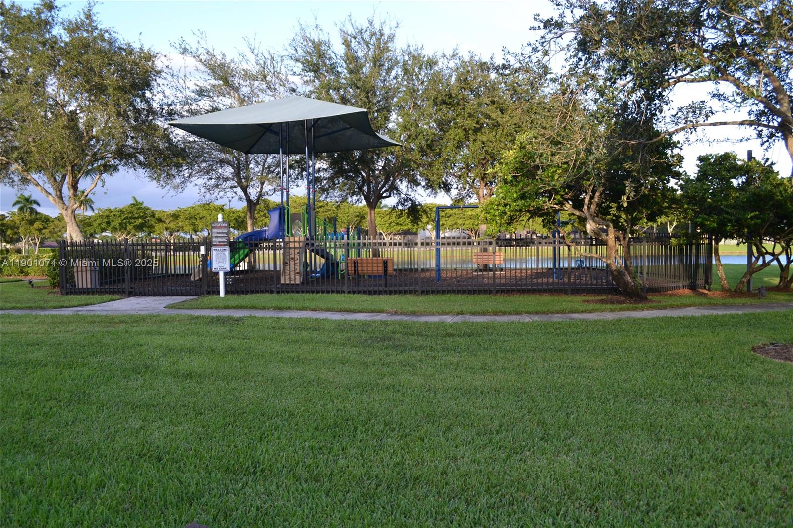 22418 Southwest 94th Path Cutler Bay, FL 33190 - Photo 70 of 71 a view of a park with large trees