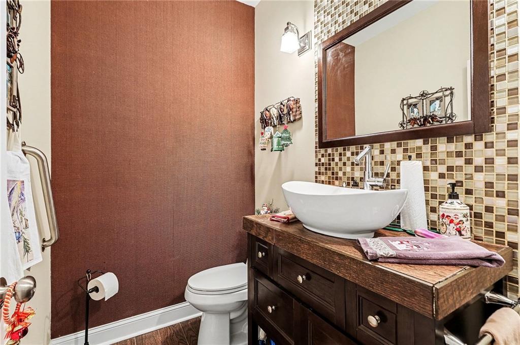 7537 Berea Road Winston, GA 30187 - Photo 15 of 37 a bathroom with a sink toilet and mirror