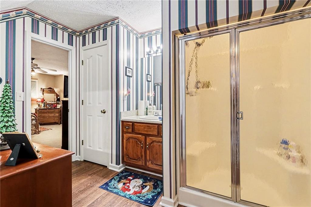 7537 Berea Road Winston, GA 30187 - Photo 26 of 37 a view of an entryway with wooden floor and a livingroom view