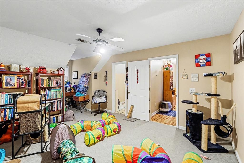 7537 Berea Road Winston, GA 30187 - Photo 28 of 37 a living room filled with furniture and a couch