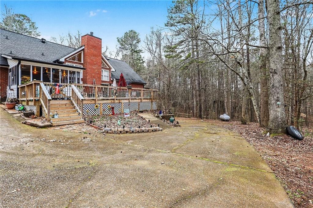 7537 Berea Road Winston, GA 30187 - Photo 33 of 34 a view of outdoor space yard and basketball court