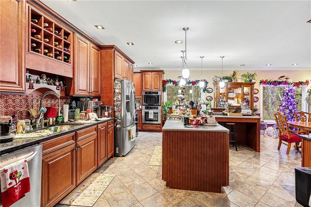 7537 Berea Road Winston, GA 30187 - Photo 6 of 34 a view of a kitchen and dining area