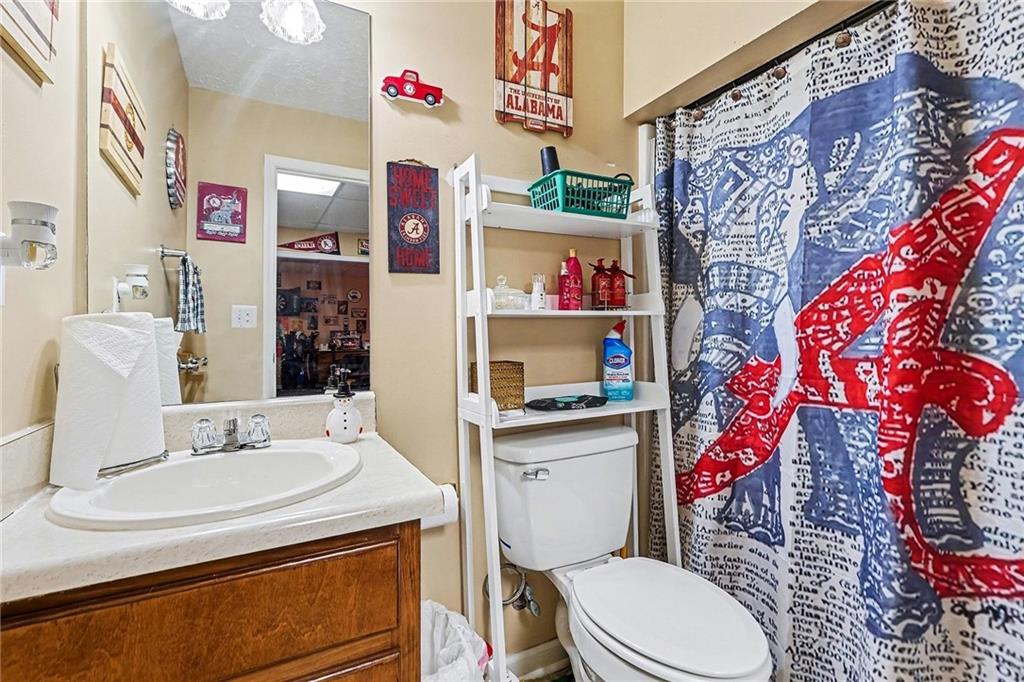 7537 Berea Road Winston, GA 30187 - Photo 8 of 37 a bathroom with a sink toilet and shower