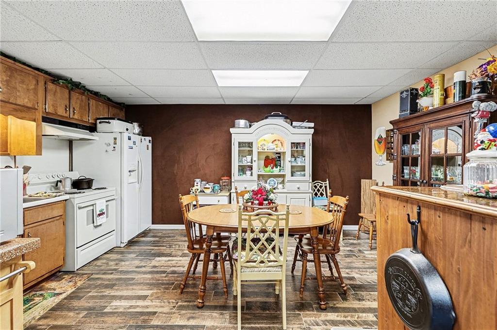 7537 Berea Road Winston, GA 30187 - Photo 9 of 37 a view of a dining room with furniture window and wooden floor