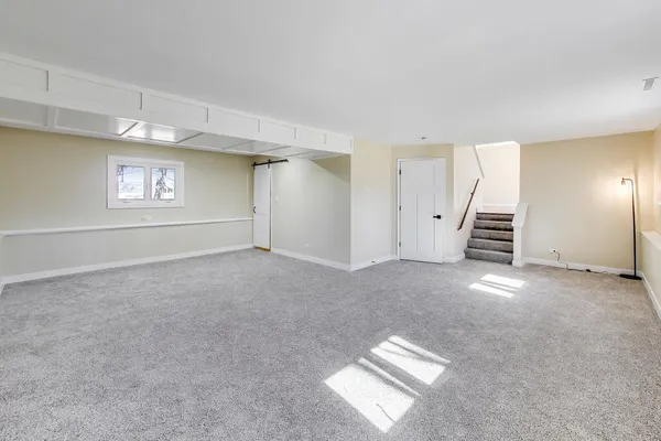 a view of a livingroom with a staircase