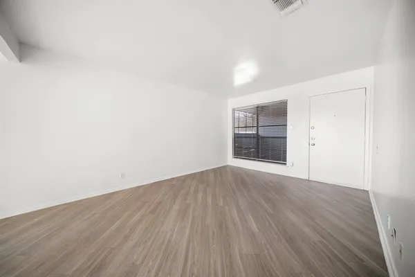 a view of kitchen with wooden floor