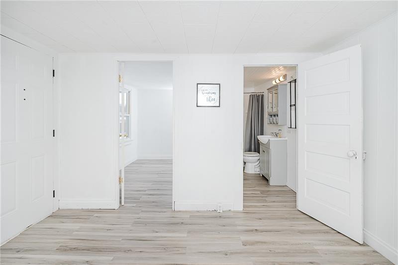 336 Walkchalk Road Kittanning, PA 16201 - Photo 11 of 49 a view of wooden floor and windows in a room