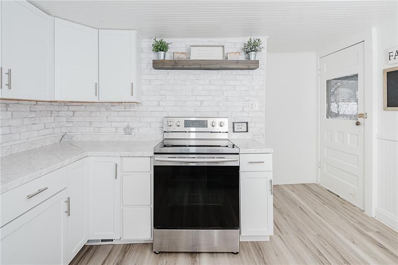 336 Walkchalk Road Kittanning, PA 16201 - Photo 21 of 49 a stove top oven sitting inside of a kitchen