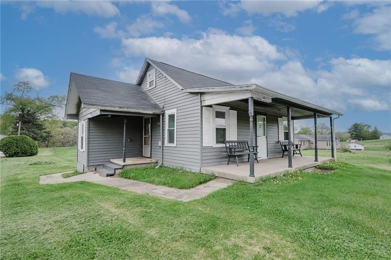 336 Walkchalk Road Kittanning, PA 16201 - Photo 7 of 49 a view of a house with a yard and sitting area