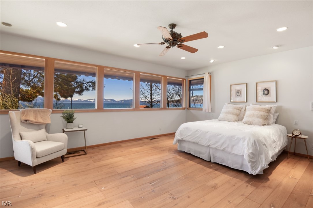 949 Lakeshore Boulevard Incline Village, NV 89451 - Photo 15 of 33 a bedroom with a large bed and a window