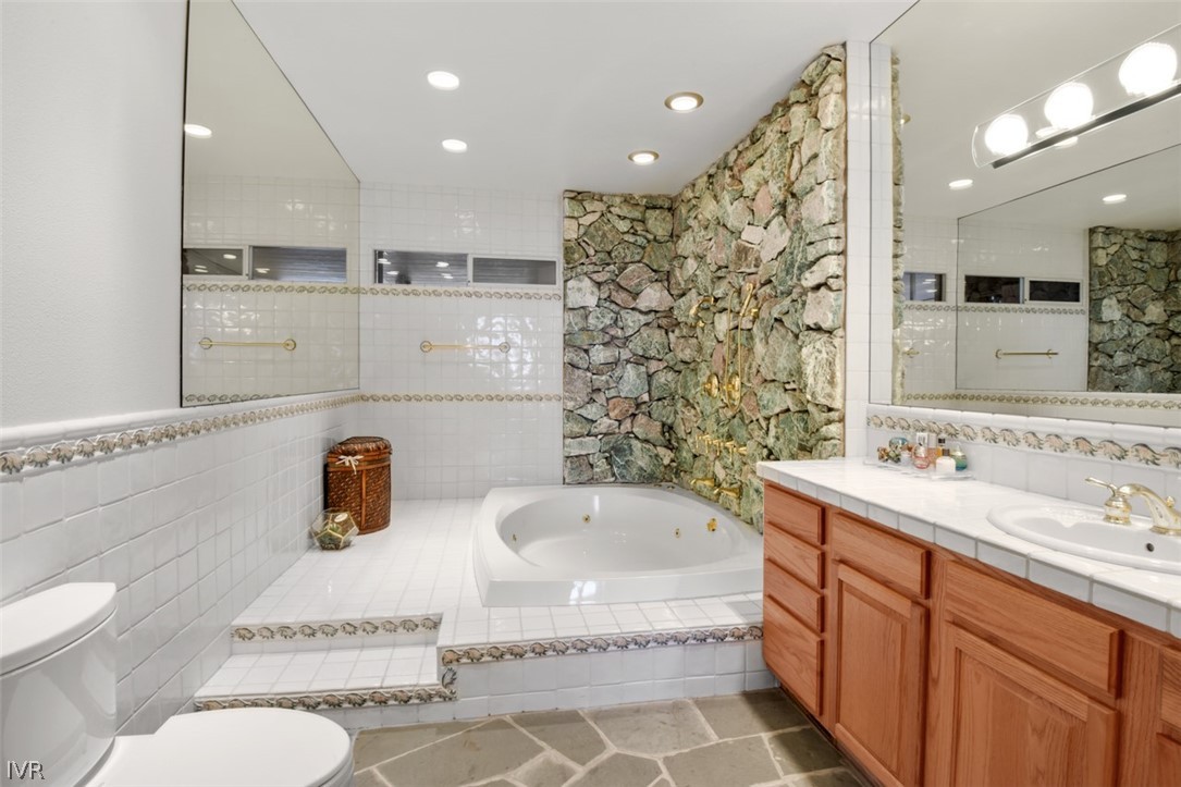 949 Lakeshore Boulevard Incline Village, NV 89451 - Photo 17 of 33 a bathroom with a sink mirror toilet and bathtub