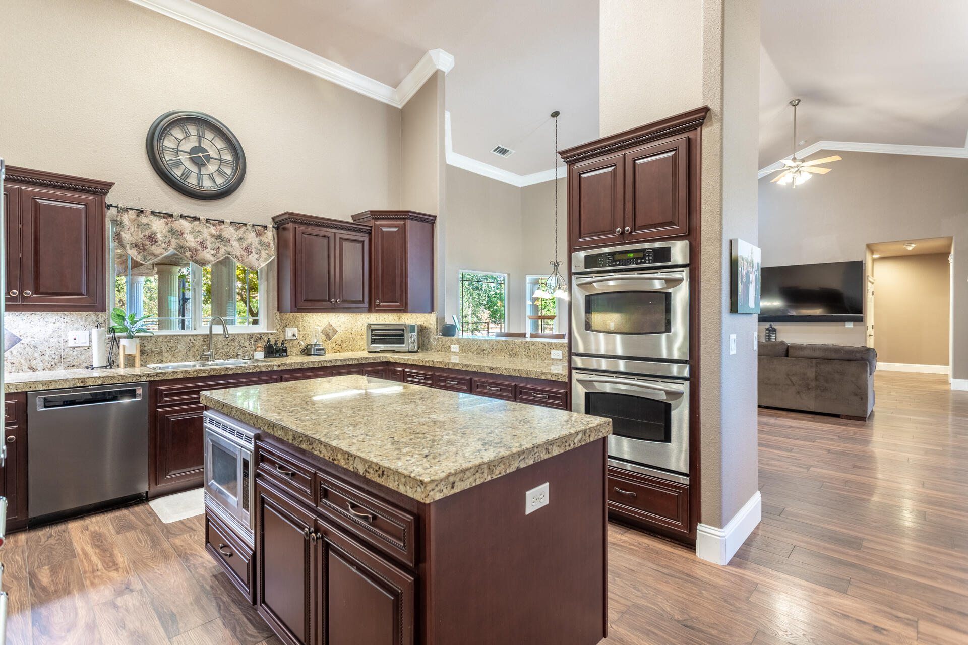 7307 Del Rico Court Palo Cedro, CA 96073 - Photo 11 of 55 a kitchen with a stove cabinets and stainless steel appliances