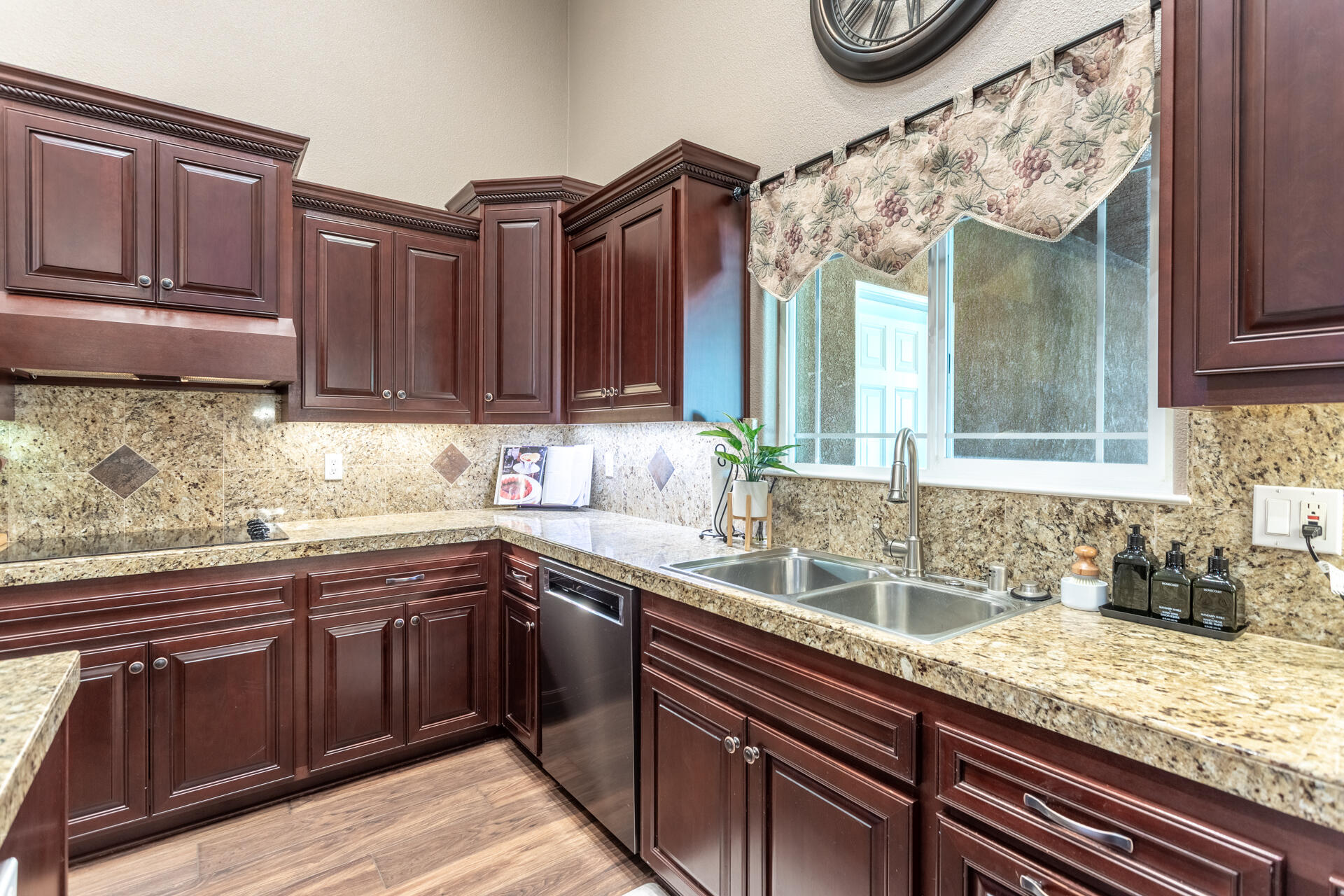 7307 Del Rico Court Palo Cedro, CA 96073 - Photo 13 of 55 a kitchen with stainless steel appliances granite countertop a sink and cabinets