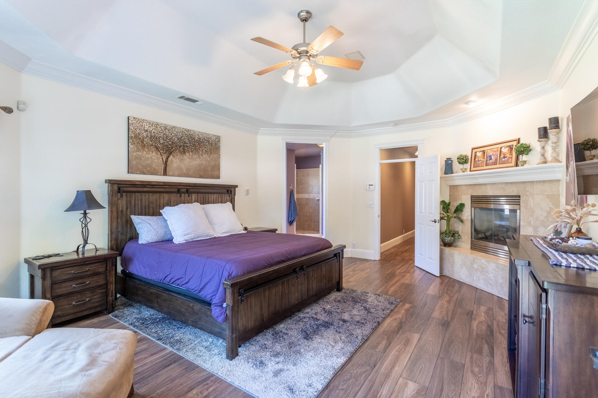 7307 Del Rico Court Palo Cedro, CA 96073 - Photo 18 of 55 a bedroom with bed and wooden floor