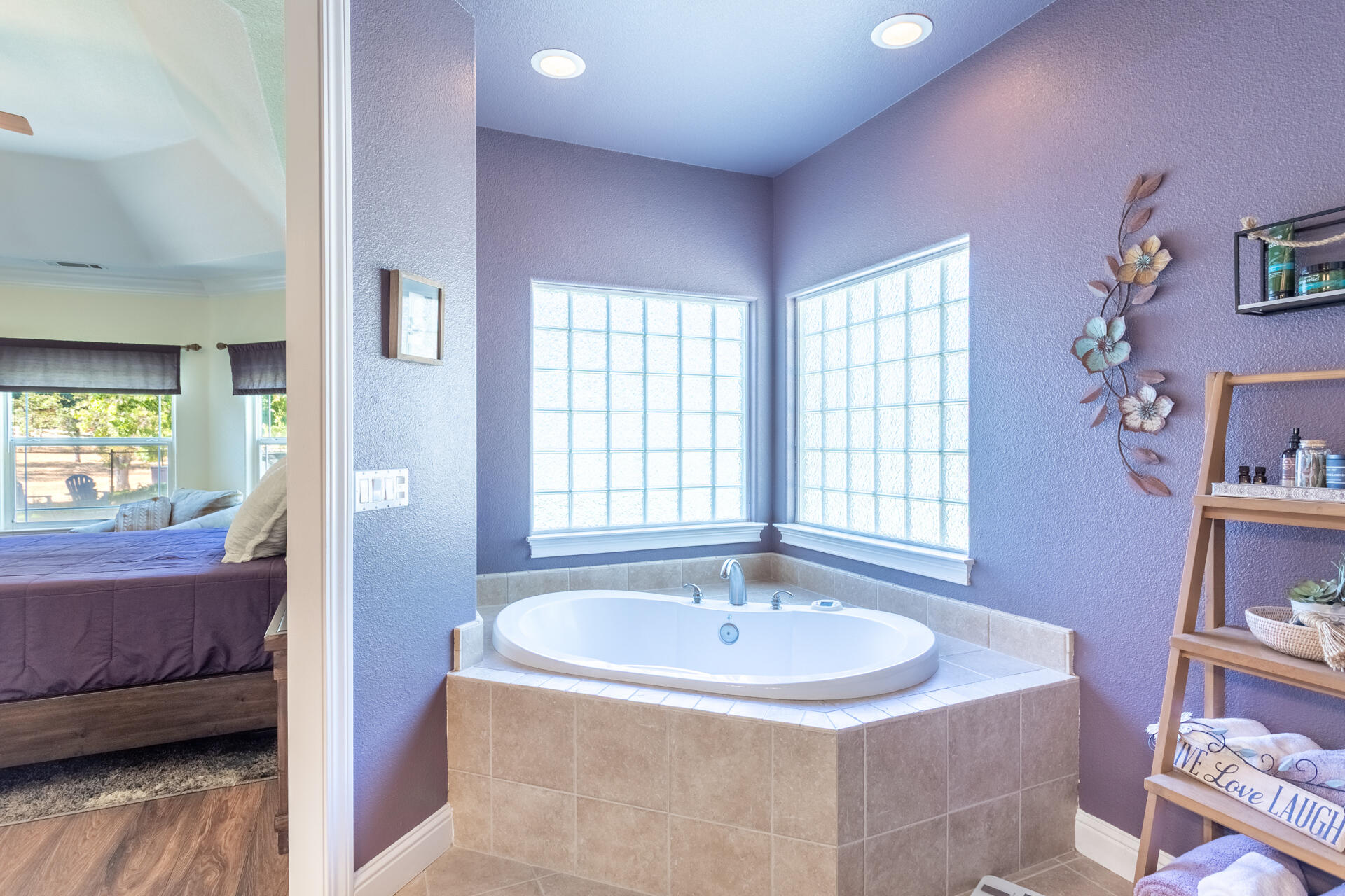 7307 Del Rico Court Palo Cedro, CA 96073 - Photo 20 of 55 a bathroom with a tub sink and mirror
