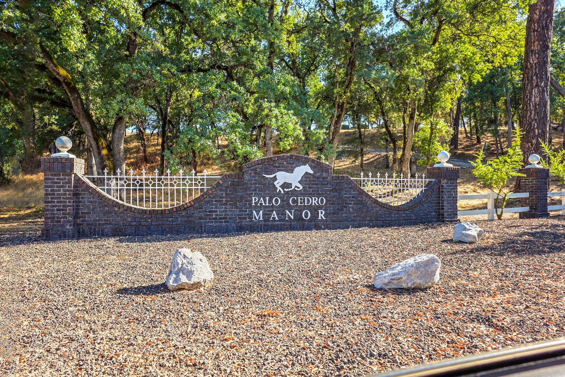 7307 Del Rico Court Palo Cedro, CA 96073 - Photo 2 of 55 a view of a bench in the backyard