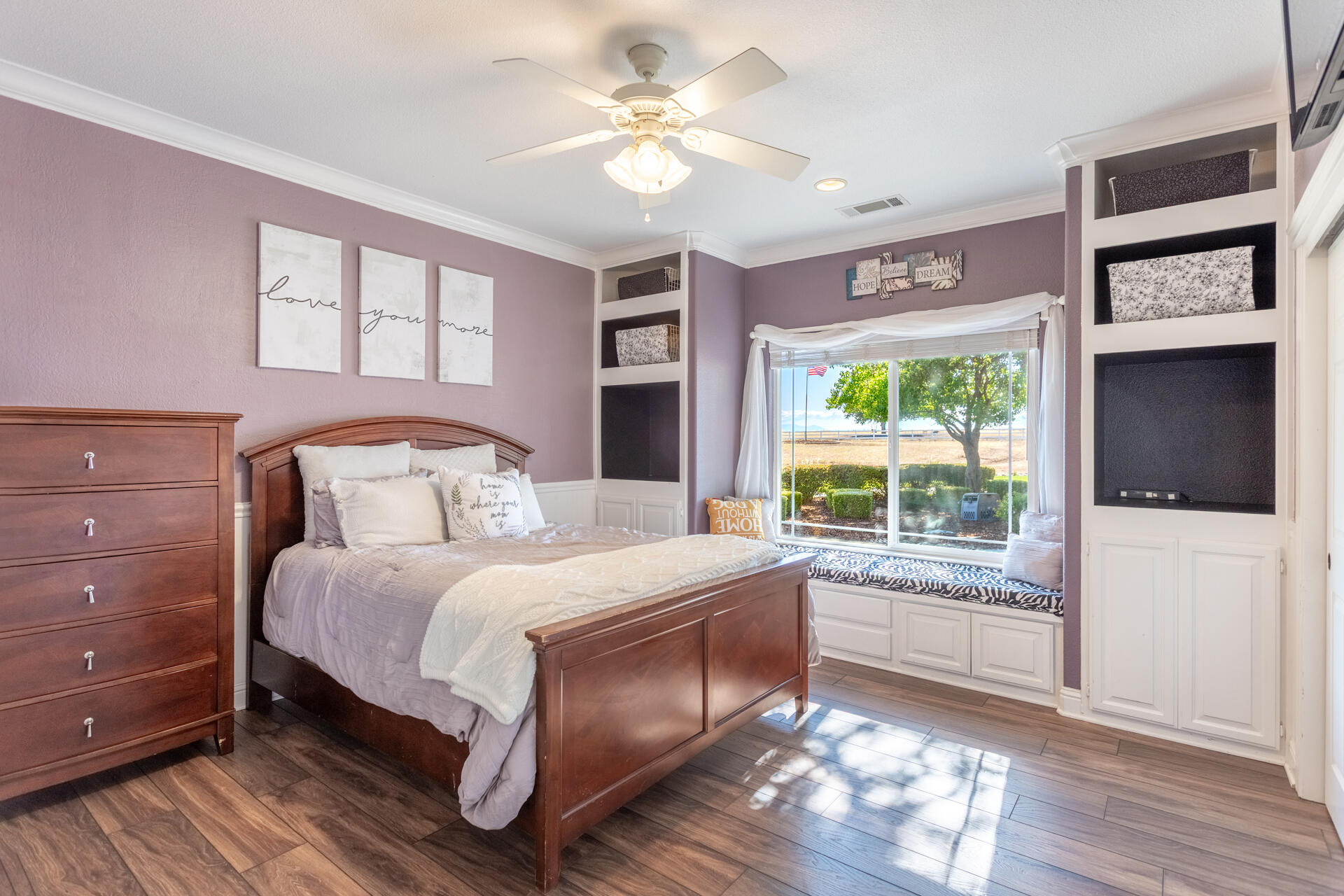 7307 Del Rico Court Palo Cedro, CA 96073 - Photo 21 of 55 a bedroom with a large bed and a window