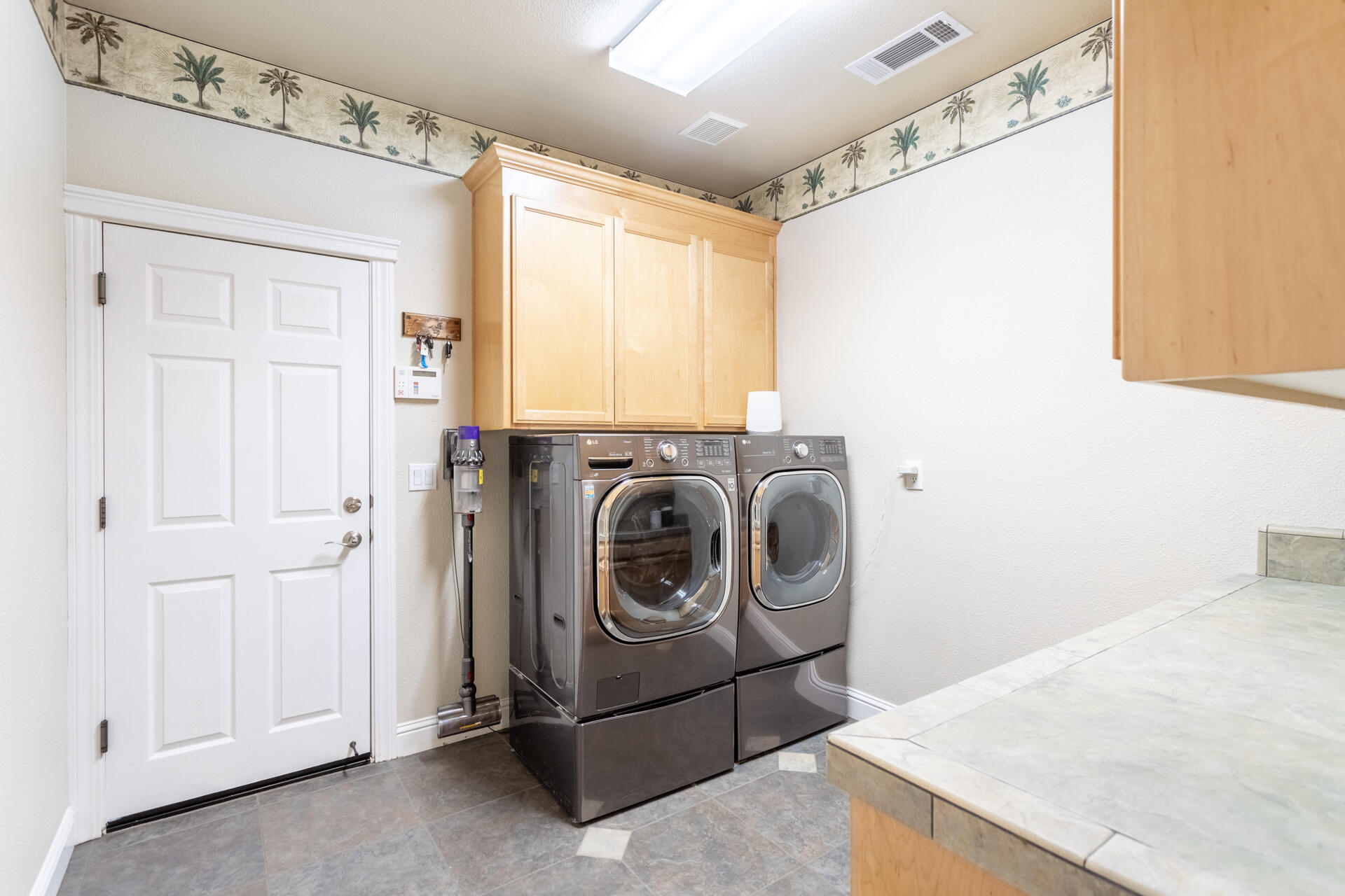 7307 Del Rico Court Palo Cedro, CA 96073 - Photo 30 of 55 a utility room with dryer and washer