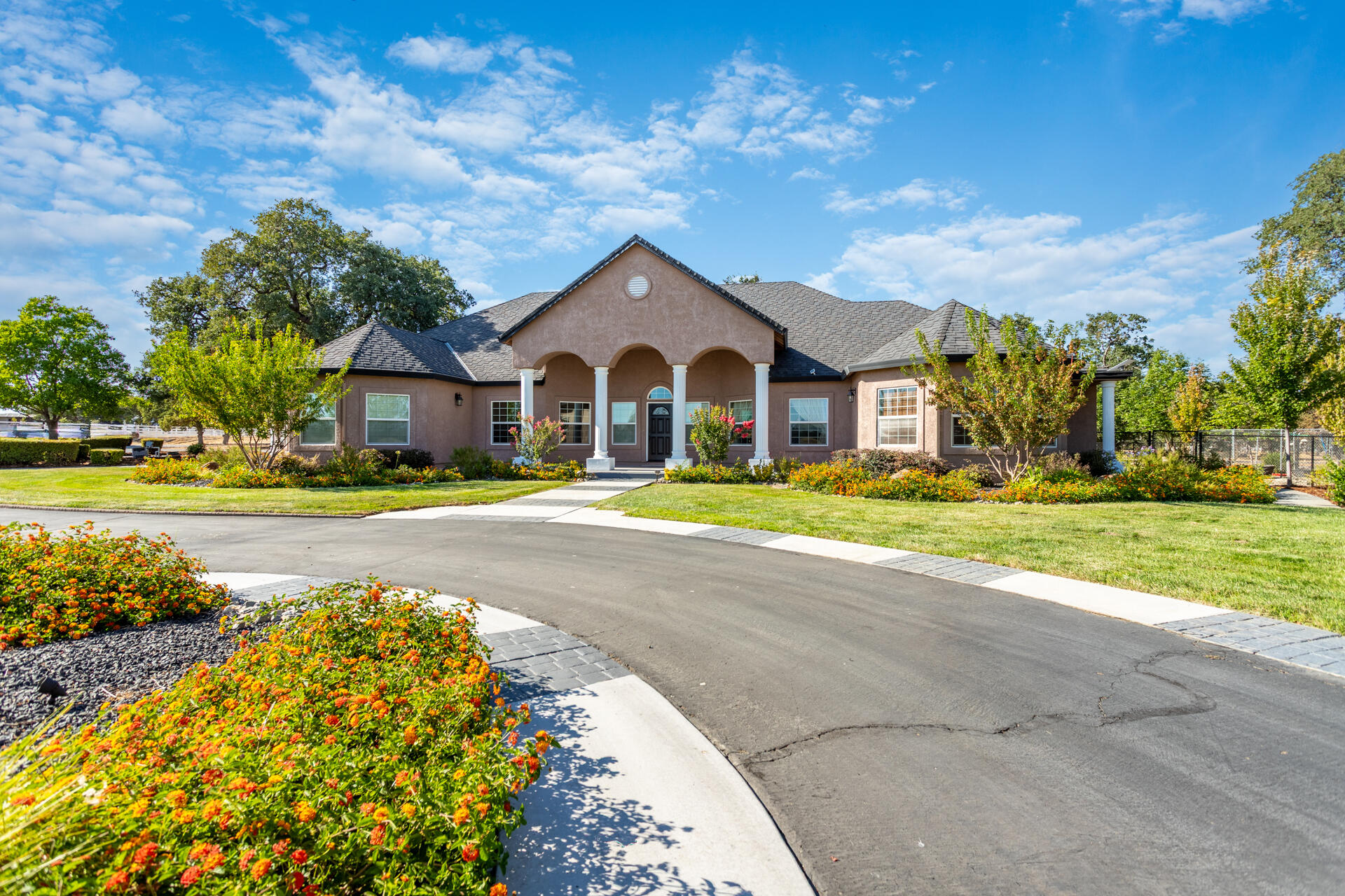 7307 Del Rico Court Palo Cedro, CA 96073 - Photo 4 of 55 a view of a house with a big yard and large trees