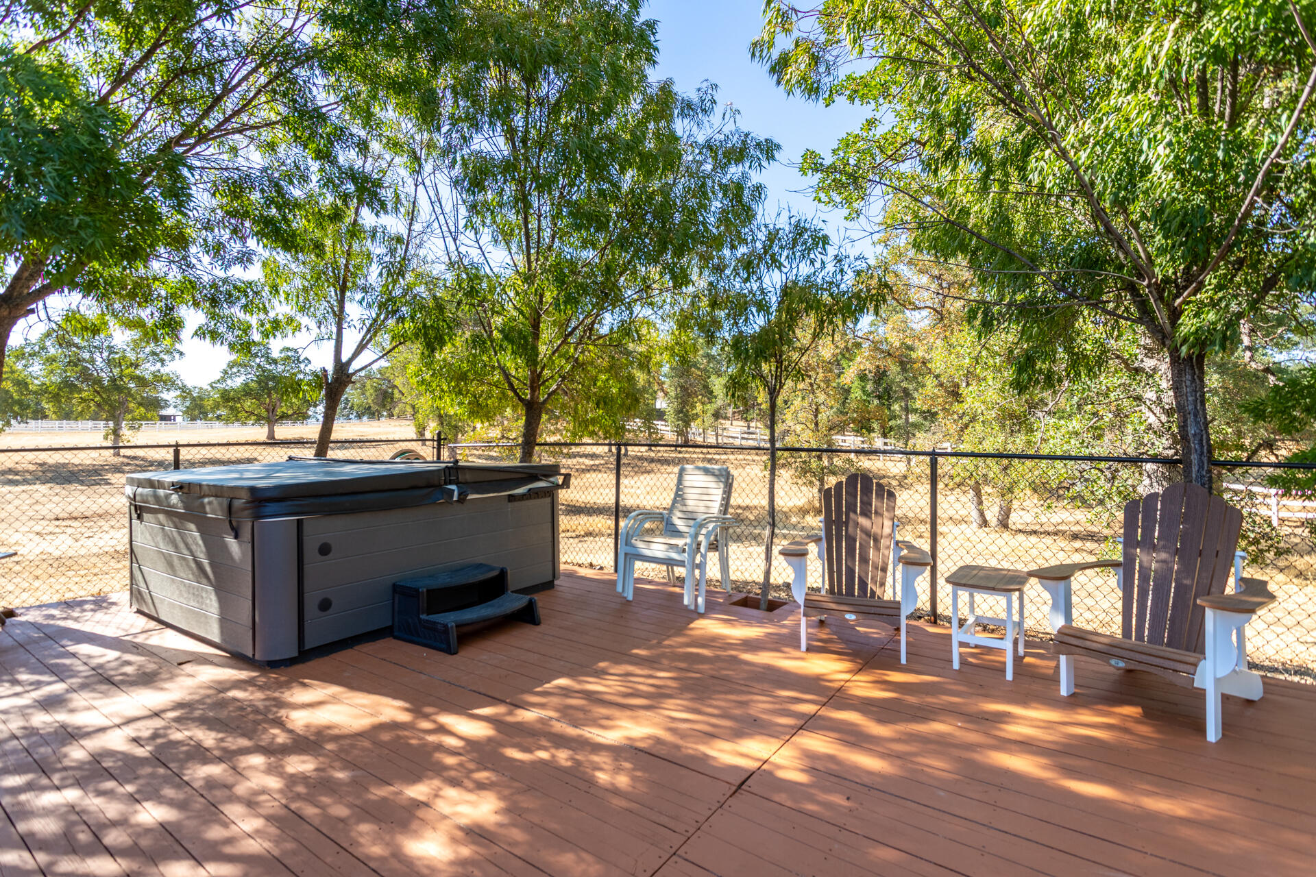 7307 Del Rico Court Palo Cedro, CA 96073 - Photo 45 of 55 a view of a deck with two chair and table
