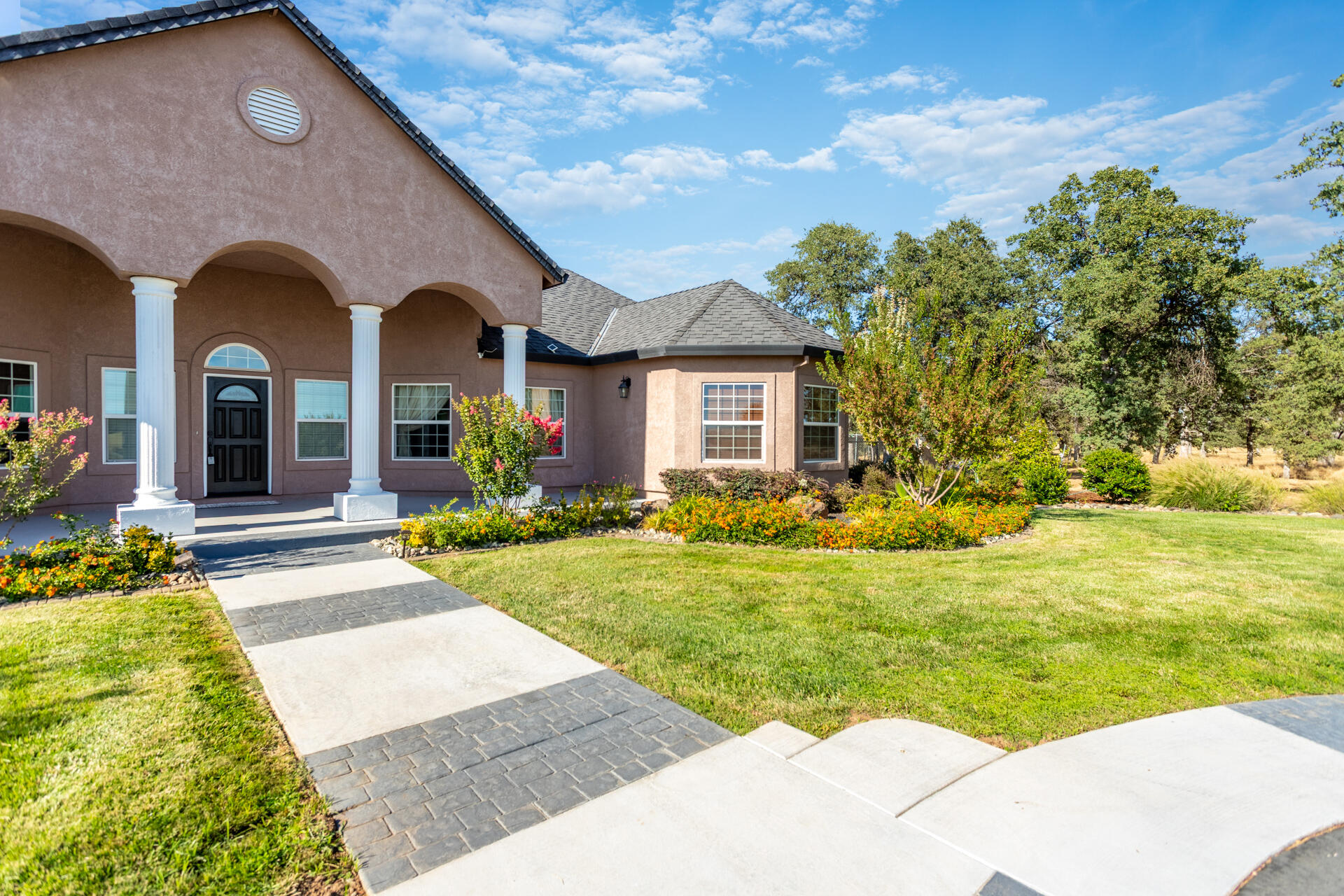 7307 Del Rico Court Palo Cedro, CA 96073 - Photo 5 of 55 a front view of house with yard