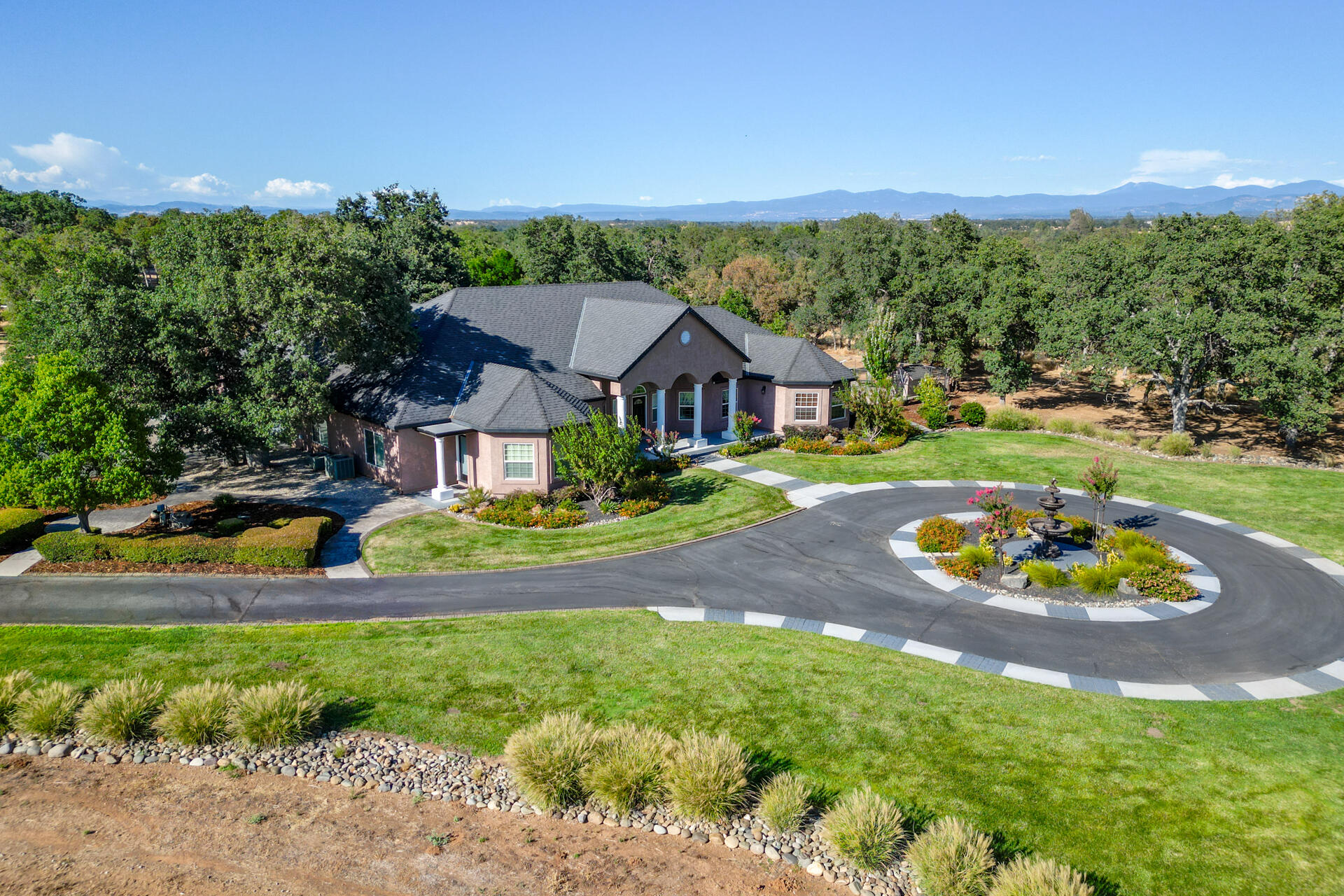 7307 Del Rico Court Palo Cedro, CA 96073 - Photo 53 of 55 a view of an house with backyard space and garden