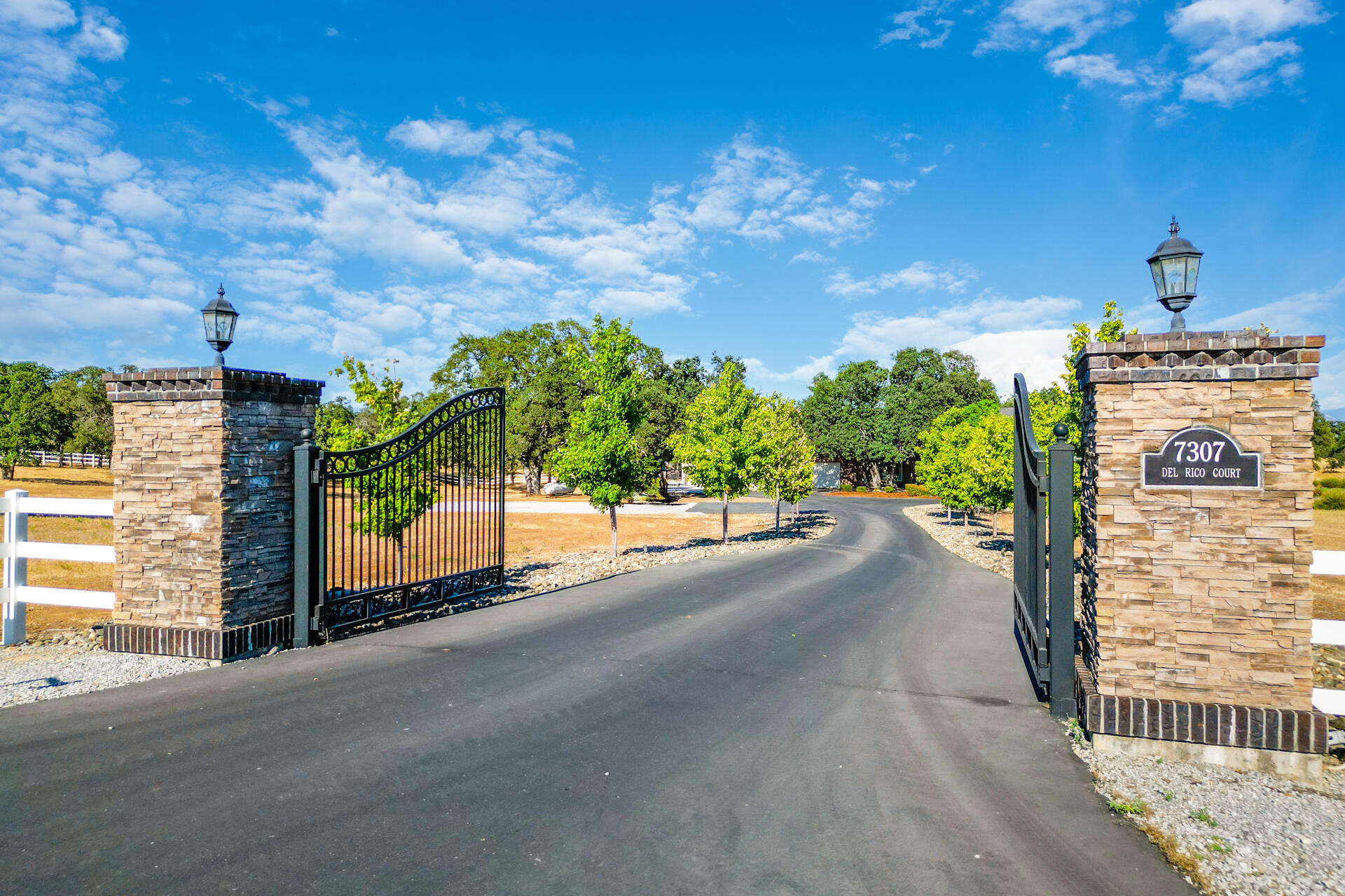 7307 Del Rico Court Palo Cedro, CA 96073 - Photo 55 of 55 a view of a street with a building in the background