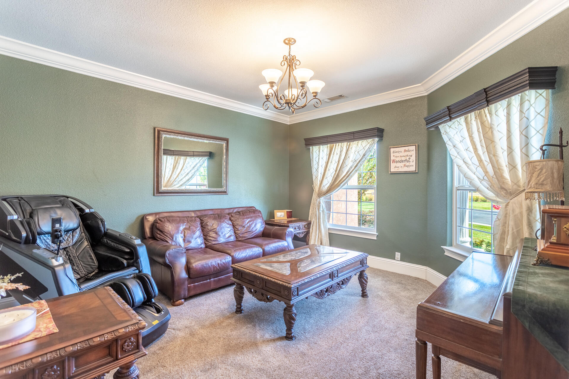 7307 Del Rico Court Palo Cedro, CA 96073 - Photo 10 of 55 a living room with furniture and a chandelier