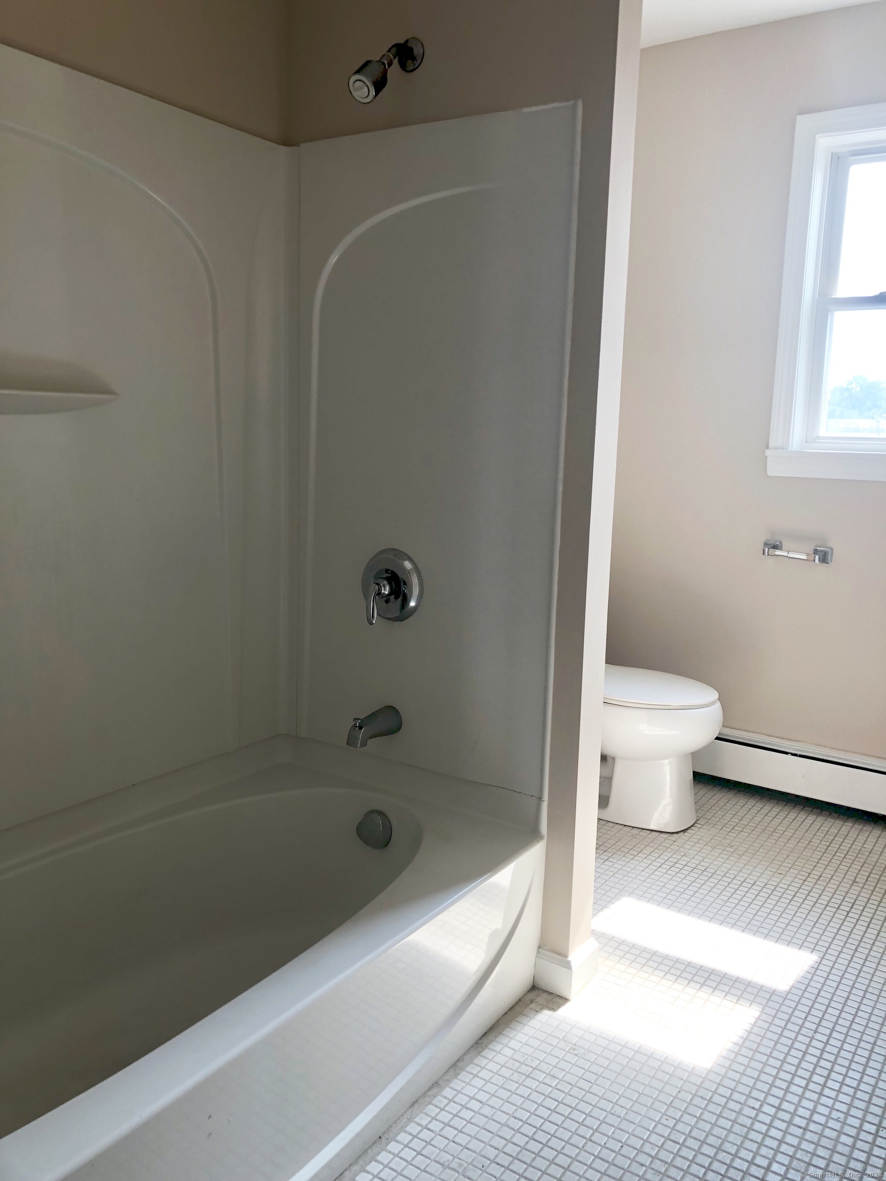 910 Boston Post Road, Unit 3 West Haven, CT 06516 - Photo 4 of 7 a bathroom with a bathtub and a toilet