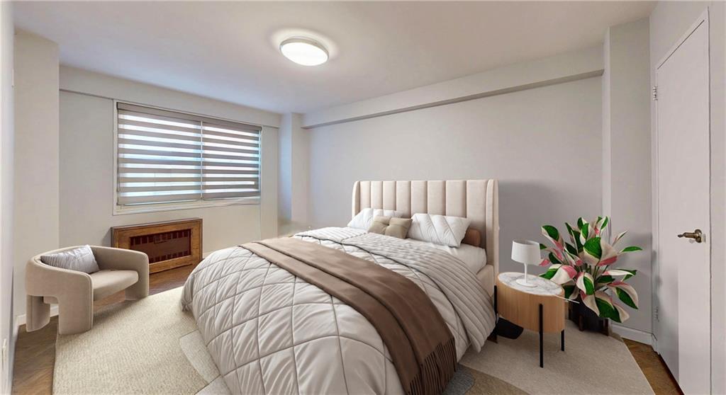 2829 West 5th Street, Unit 3J Brooklyn, NY 11224 - Photo 5 of 11 a bedroom with a bed and potted plant