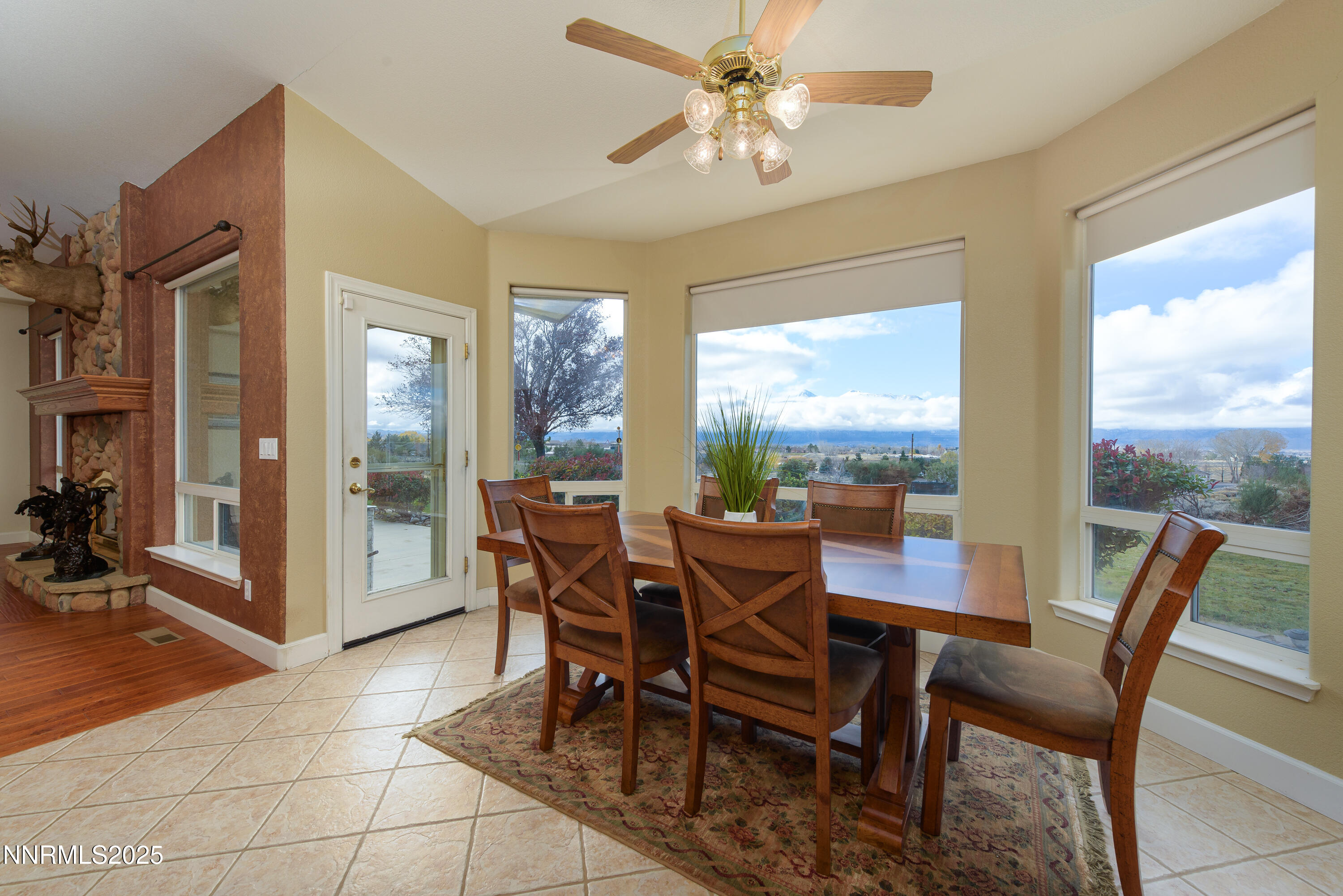 1572 Sawmill Road Gardnerville, NV 89410 - Photo 13 of 43 a view of a dining room with furniture window and outside view