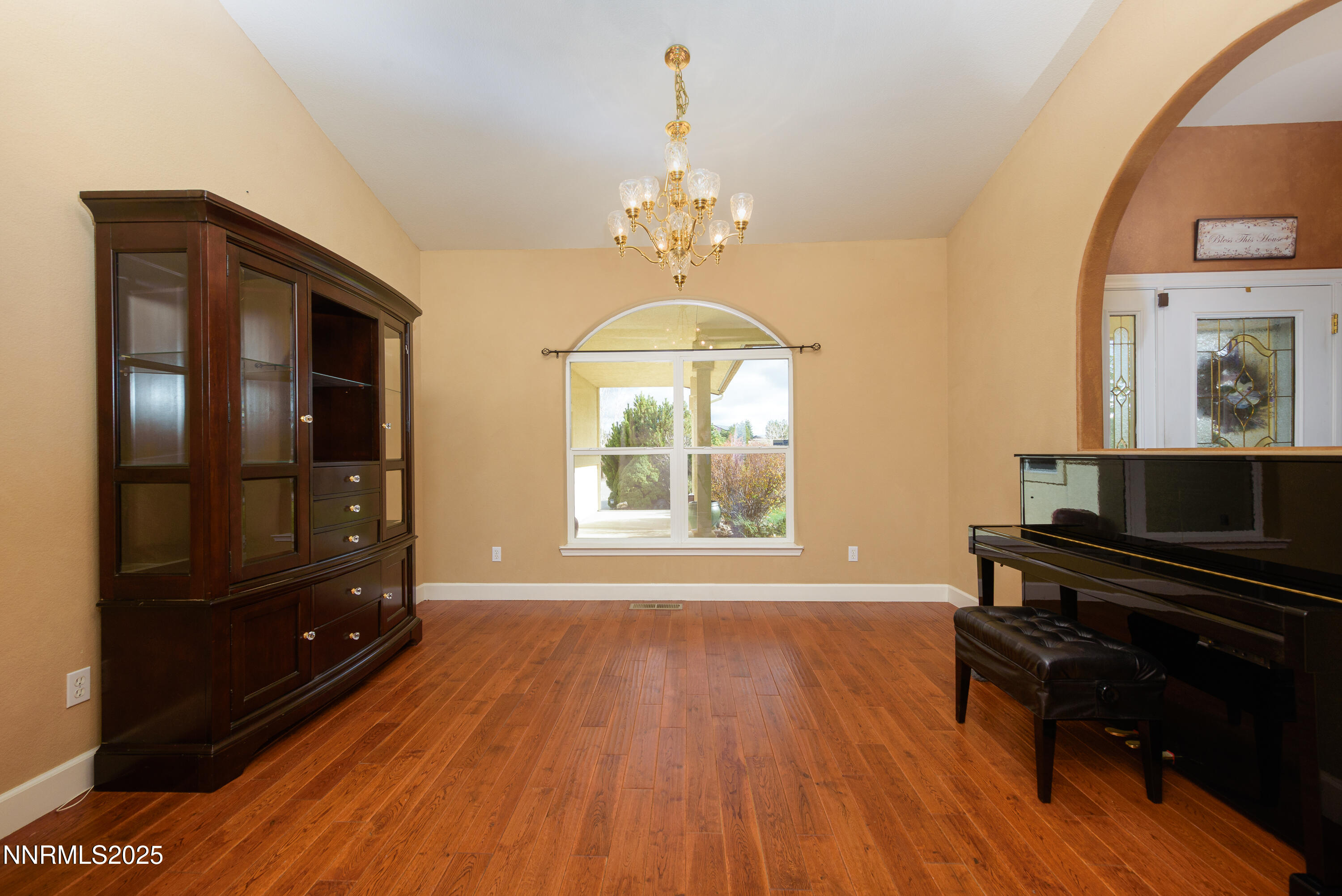 1572 Sawmill Road Gardnerville, NV 89410 - Photo 19 of 43 a living room with a flat screen tv and a window