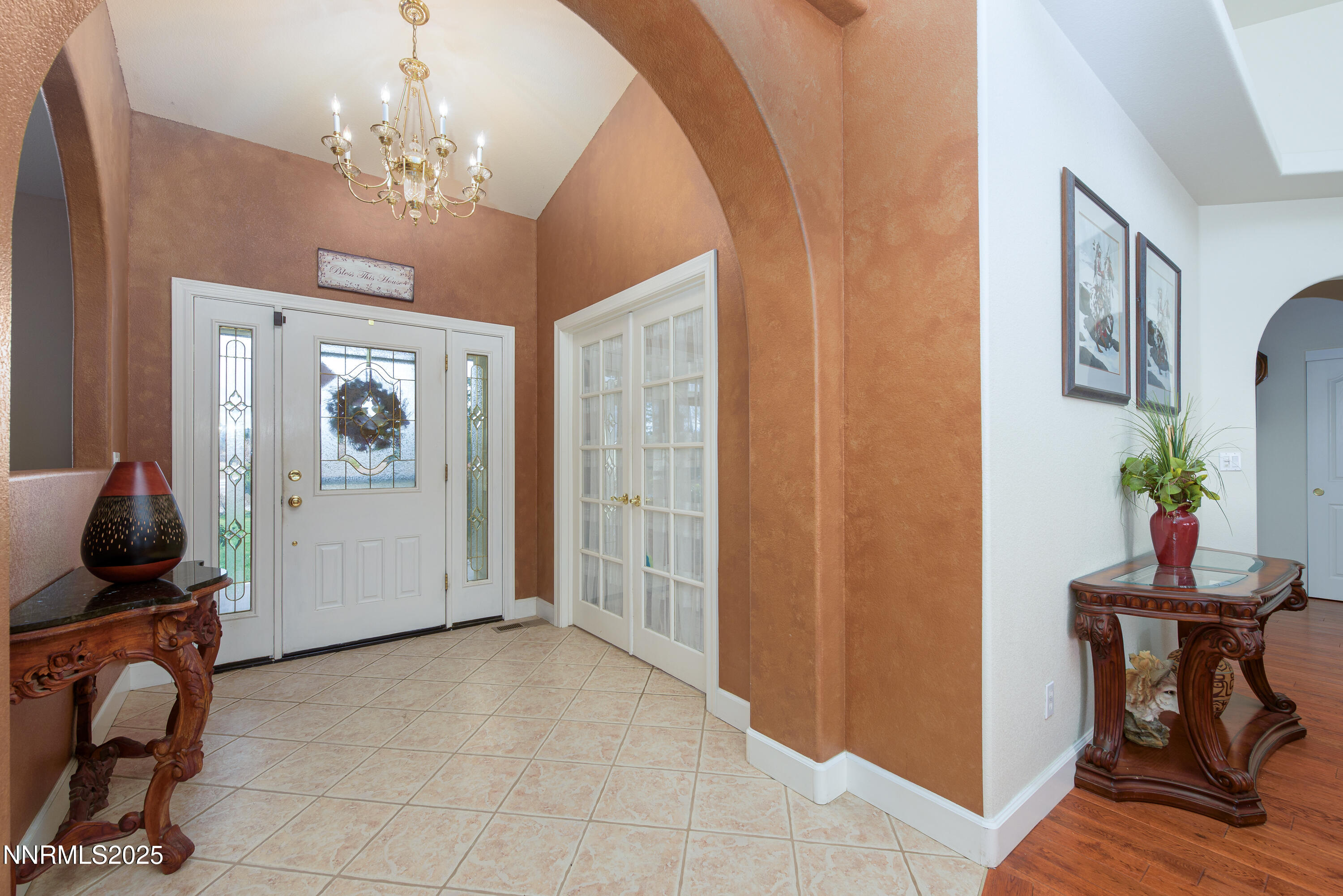 1572 Sawmill Road Gardnerville, NV 89410 - Photo 7 of 43 a living room with furniture and a chandelier